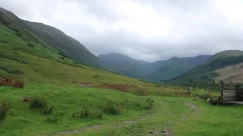View from the trail  head at start of path leading up Ben Nevis Stock Footage 247136337