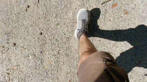 View of a trail run from the athlete's point of view of the foot Stock Footage 120519524
