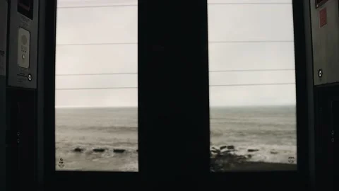 View from the train to the coastal line during the movement of the train Stock Footage 209244460