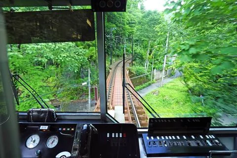 View from train driver's cabin on a scenic railway journey through lush gre.. Stock Photos