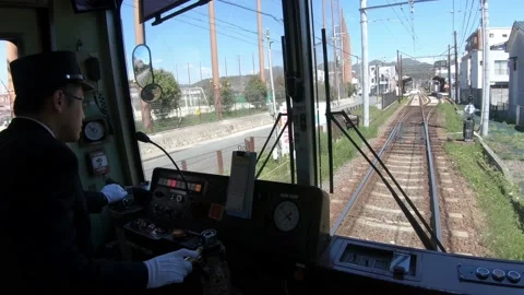 View of train engine driver inside the Japanese Kyoto local train cabin. Japan Video stock 165463537