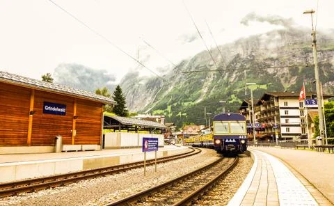 View of train from Grindelwald train station in swiss alpine Jungfrau region Stock Photos