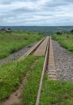 View of the train line in perspective angle, ruined house Stock Photos