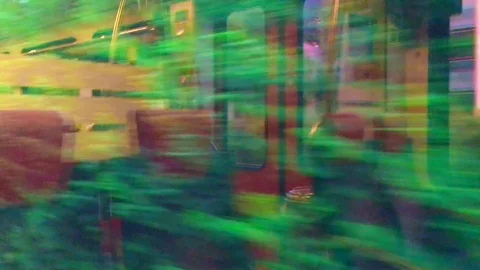 View From Train Over Alpine Lake with Mountain and Houses Stockbeeldmateriaal 112408515