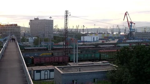 The view of the train station on the background of the port and cranes Stock Footage 79811350