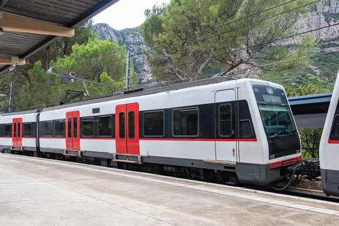 View of a train stopped at a station Stock Photos