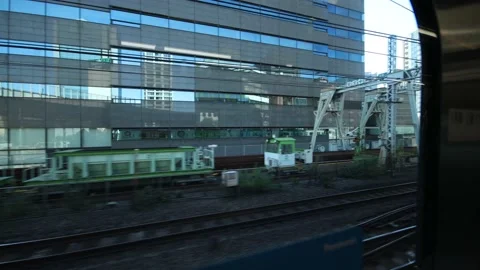 View from the train in Tokyo Japan. Cityscape in sunny day. Stock Footage 220096035