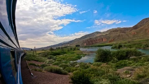View of the Train with a turn in the mountains 스톡 동영상 282366486