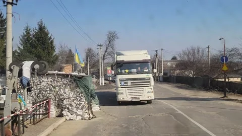 View from train of Ukrainian suburbs leaving Kyiv to Lviv During War Stock Footage 221098504