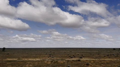View from train the vast expanse of barren Nullabor treeless plain flying past Video stock 242831976