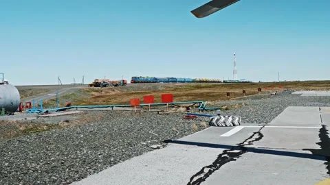 View of train which transport fuel from landing platform. Russian Tundra Stock Footage 165692150