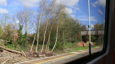 View from a train window arriving at small station Stock Footage 37223477