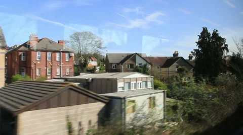 View from a train window backs of houses Stock Footage 37223460
