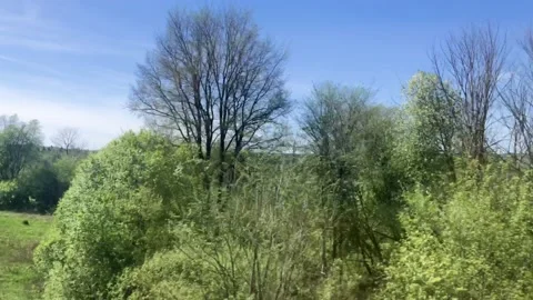 View from train window. Beautiful countryside landscapes from outside the train Stock Footage 132334763