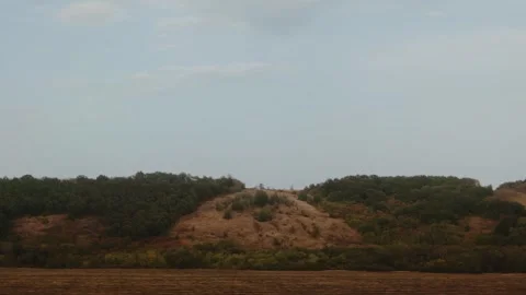 View from the train window of a beautiful landscape, nature, hill and mountain Stock Footage 317090694