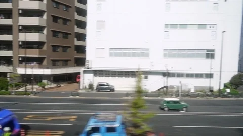 View from train window to cityscape of Tokyo Stock Footage 109425390