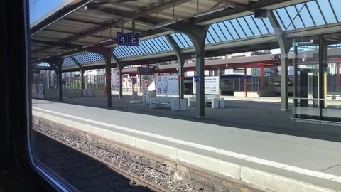 View from the train window on the empty the  train piron. Stock Footage 74247494