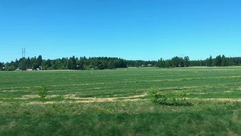 View from train window, Finland,fields with houses Video stock 91362457