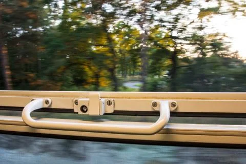 View from train window in high speed during sunset 库存照片