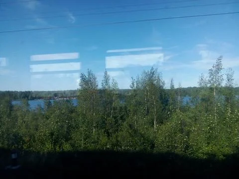 View from the train window to the lake Stock Photos