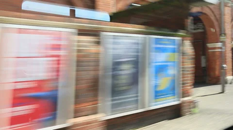 View from a train window leaving railway station Stock Footage 37224257