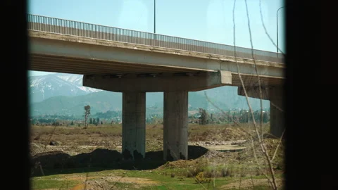 View from train window in motion -bridge view Stock Footage 180061544