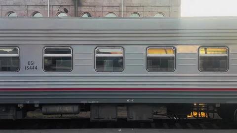 View from the train window of a passenger train with a new carriage. The concept Stock Footage 303621171