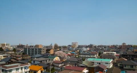 The view from the train window is passing tokyo city. Stock Photos