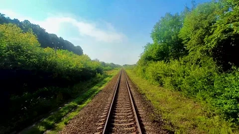View from the train window on the rails going into the distance Video stock 220445475
