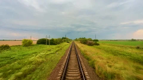 View from the train window on the rails going into the distance Stock Footage 220445490