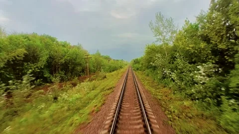 View from the train window on the rails going into the distance Stock Footage 220445510