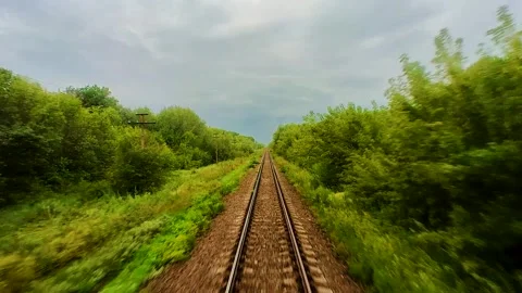 View from the train window on the rails going into the distance Stock Footage 321611725