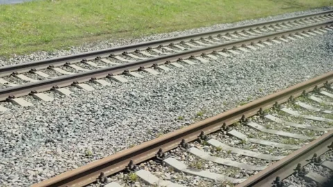 View from the train window on the railway tracks Stock-Footage 313815715