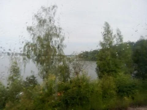 View from the train window in rainy weather Stock Photos