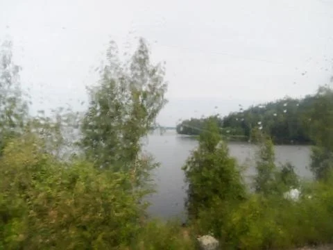 View from the train window in rainy weather Stock Photos