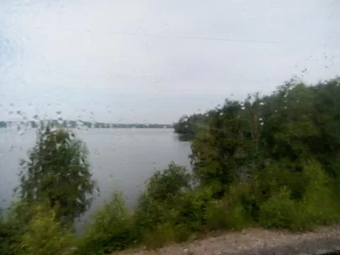 View from the train window in rainy weather Stock Photos