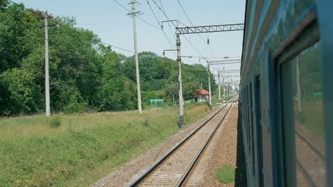 View from train Window - track, row of wagons Stock Footage 92941481