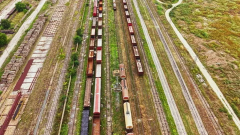 View of a train yard with multiple freight cars and tracks clearly seen from Stockbeeldmateriaal 341587909
