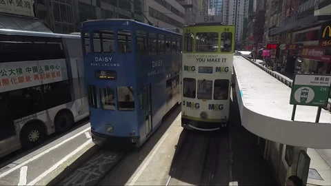 View from tram, back view vehicle shot, Hong Kong downtown street, Shau Kei Wan Stock Footage 170771253