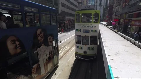 View from tram, back view vehicle shot, Hong Kong downtown street, Shau Kei Wan Stock Footage 170771267