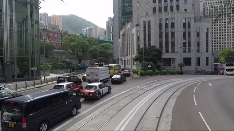 View from tram, back view vehicle shot, Hong Kong, Court of Final Appeal Stock Footage 170773308