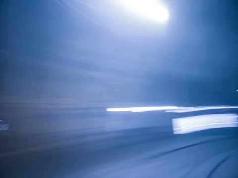 A view from the tram on the tram line on time lapse in city at night in motion. Stock Footage 128962853