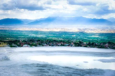 View on travertine, landscape of pine tree and mountains with clouds on Foto stock
