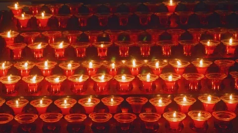 View of trembling candle flame in templle in Funshal Stock Footage 88563574