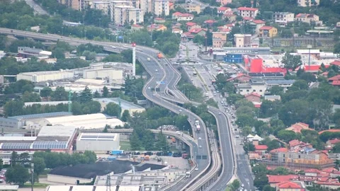 View of Trieste city, Italy. Elevated aerial view of highway road traffic Stock Footage 138897083