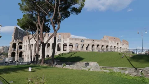View of the triumphal Arch of Constantine and the Colosseum in Rome, Italy Stock Footage 285727695