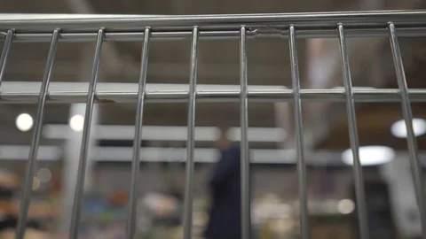 The view from the trolley: The trolley rolls around the supermarket Stock Footage 102283390