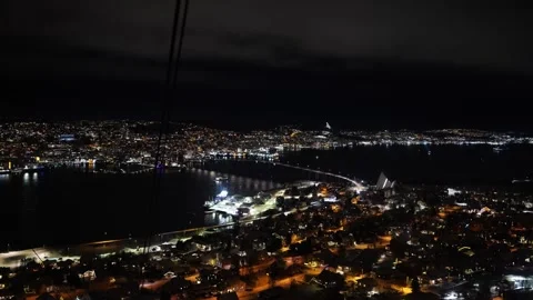 View of Tromso city and bridge from Fjellheisen cable car at night Stock Footage 301467852