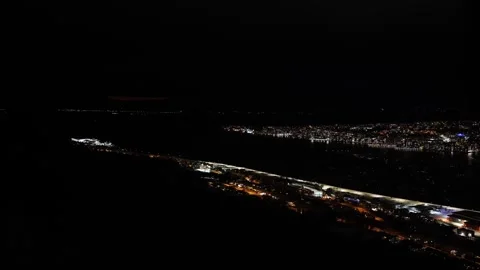 View of Tromso city out window of Fjellheisen cable car at night in Norway Stock Footage 301467853
