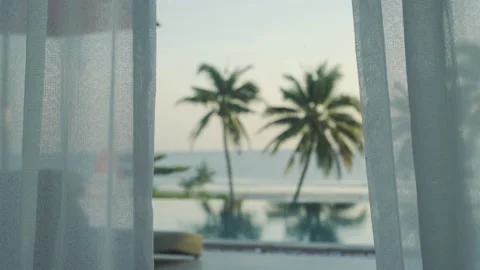 View of a tropical beach. Point of view watching through a glass window. Stock Footage 229900505